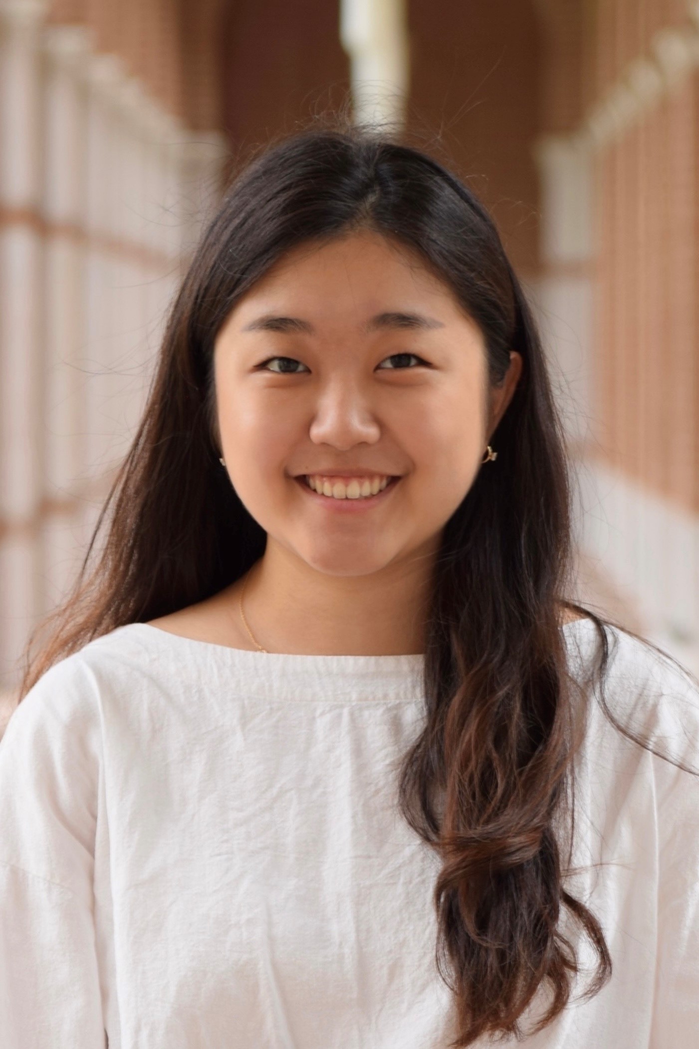 image of young woman wearing white